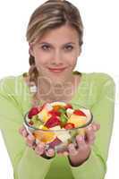 Healthy lifestyle series - Woman holding fruit salad