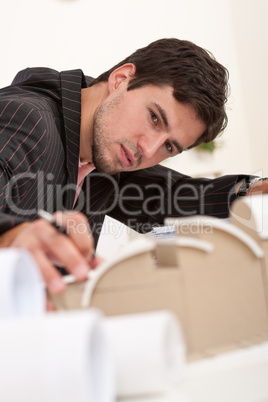 Successful architect working at office Successful architect working at office