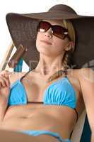 Beach - Attractive woman with hat and ice lolly