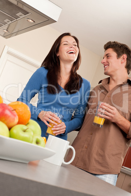 Happy couple having fun in the kitchen