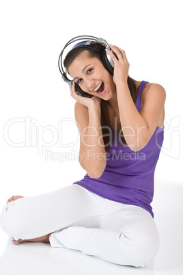 Happy teenager woman enjoy music with headphones