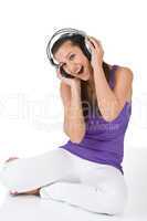 Happy teenager woman enjoy music with headphones