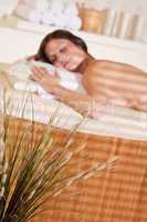 Spa - Young woman at wellness therapy massage