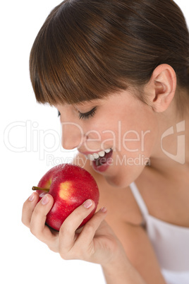 Female teenager eat apple for breakfast