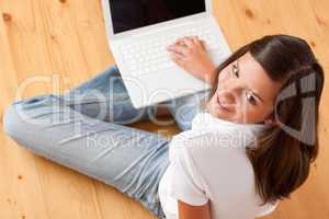 Young female teenager with laptop