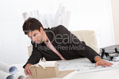 Successful architect working at office Successful architect working at office