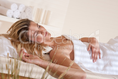 Spa - Young woman at wellness massage relaxing