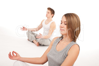 Fitness - Young healthy couple in yoga position