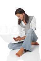 Brown hair teenager with laptop