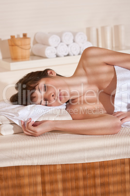 Spa - Young female client at wellness massage