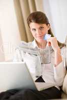 Home shopping - woman with credit card and laptop