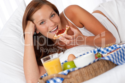 Young woman having home made breakfast