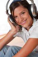 Happy teenager with headphones