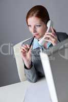 Successful business woman on the phone