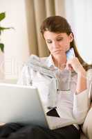 Home shopping - woman with credit card and laptop