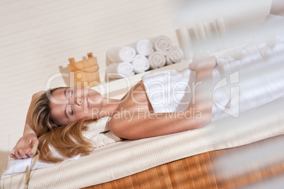 Spa - Young woman at wellness massage relaxing