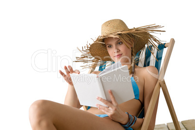 Beach - Young woman relax with book in bikini