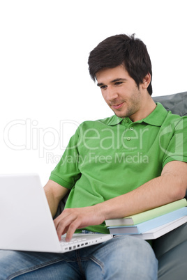 Student - Young man with laptop sitting on bean bag