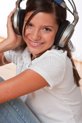 Happy teenager with headphones