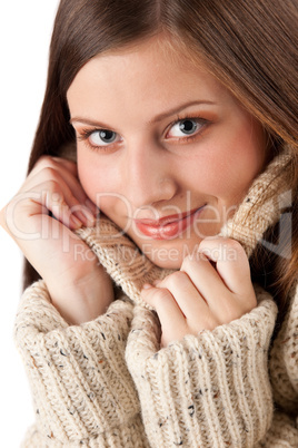 Portrait of beautiful young woman wearing turtleneck