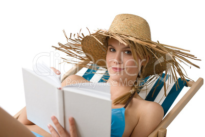 Beach - Young woman relax with book in bikini