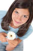Happy teenager with gerber daisy