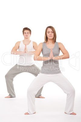 Fitness - Young healthy couple in yoga position