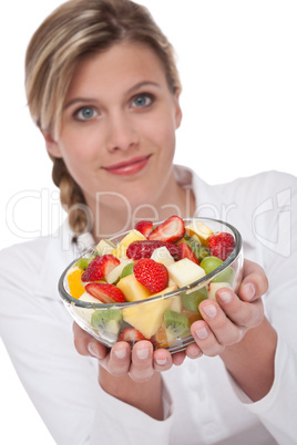 Healthy lifestyle series - Woman holding fruit salad