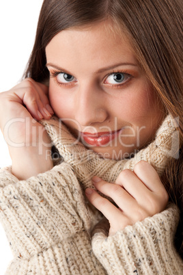 Portrait of beautiful young woman wearing turtleneck