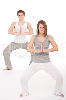 Fitness - Young healthy couple in yoga position