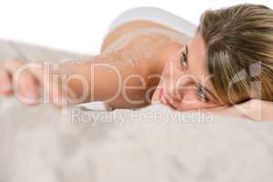 Beach - woman sunbathing on sand