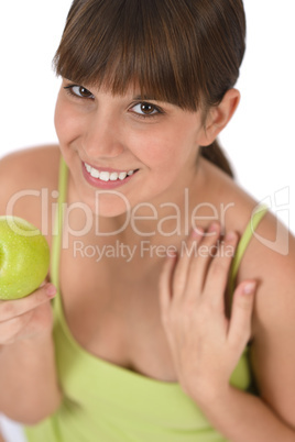 Happy female teenager with healthy apple