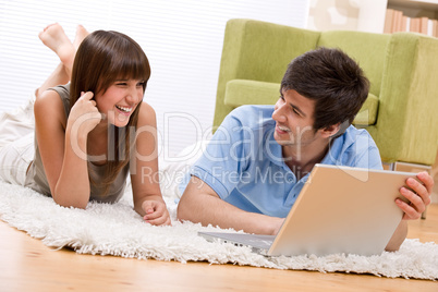 Student - two teenager with laptop in living room