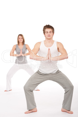 Fitness - Young healthy couple in yoga position