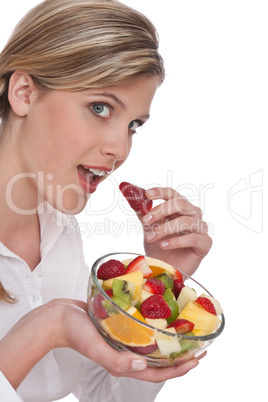Healthy lifestyle series - Woman biting strawberry