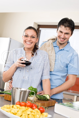 Cheerful couple in modern kitchen