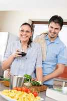 Cheerful couple in modern kitchen