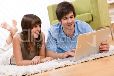 Student - two teenager with laptop in living room