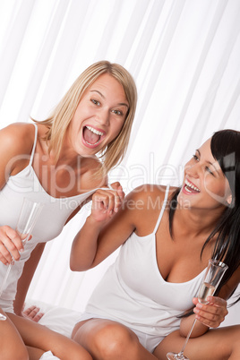 Two girlfriens having fun together