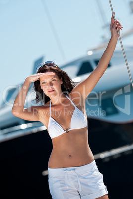 Attractive young woman in bikini on sunny day