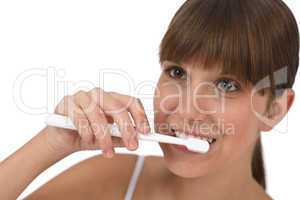 Body care - Female teenager brushing teeth