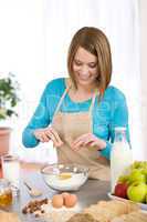 Baking - Smiling woman with healthy ingredients