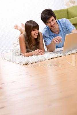 Student - two teenager with laptop in living room