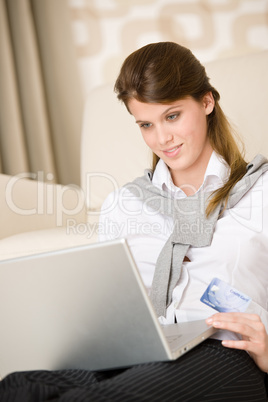 Home shopping - woman with credit card and laptop