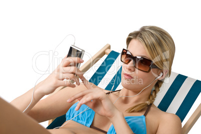 Beach - Happy woman relax in bikini with music Beach - Happy woman relax in bikini with music