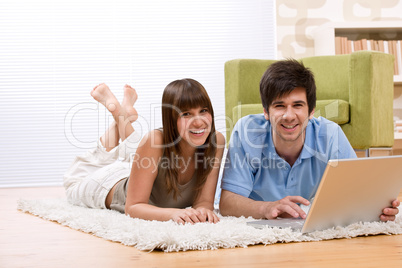 Student - two teenager with laptop in living room