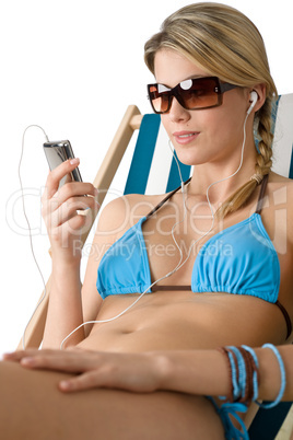 Beach - Happy woman relax in bikini with music