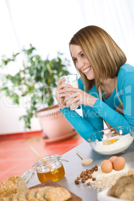 Baking - Smiling woman with healthy ingredients