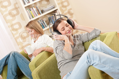 Students - Two female teenager relaxing in lounge