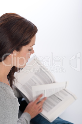 Brown hair woman reading book